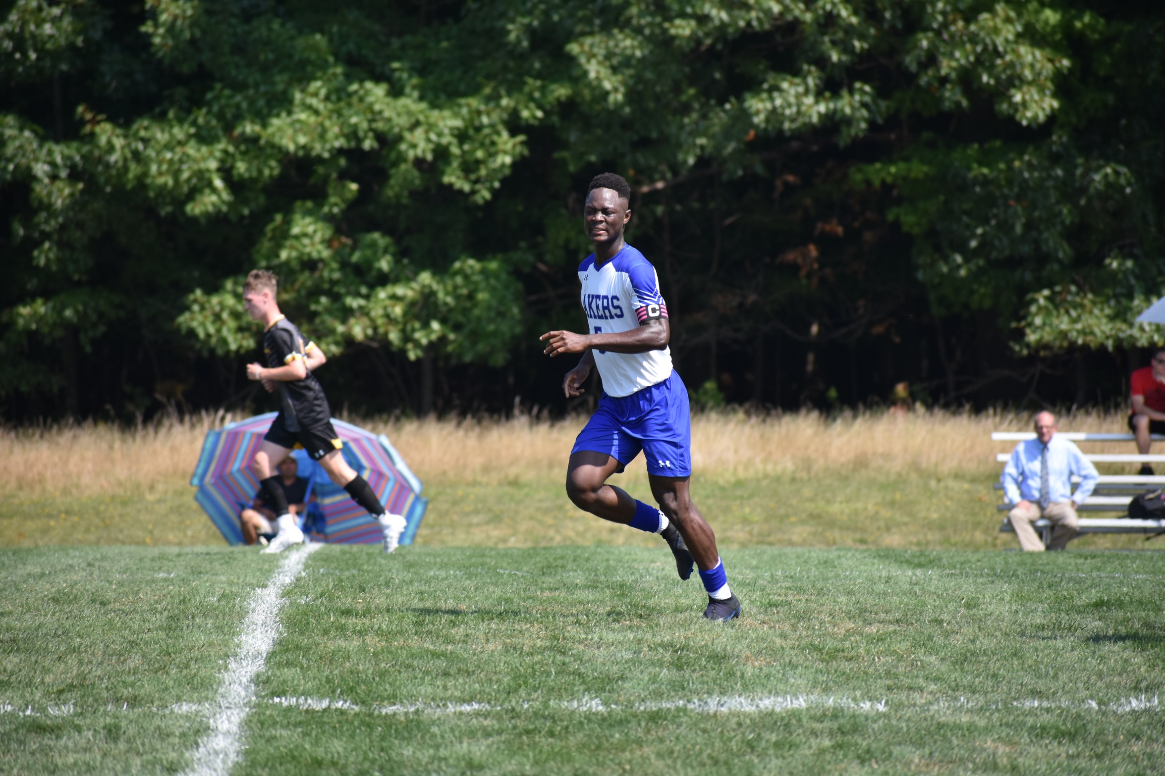 Men's soccer falls in home opener