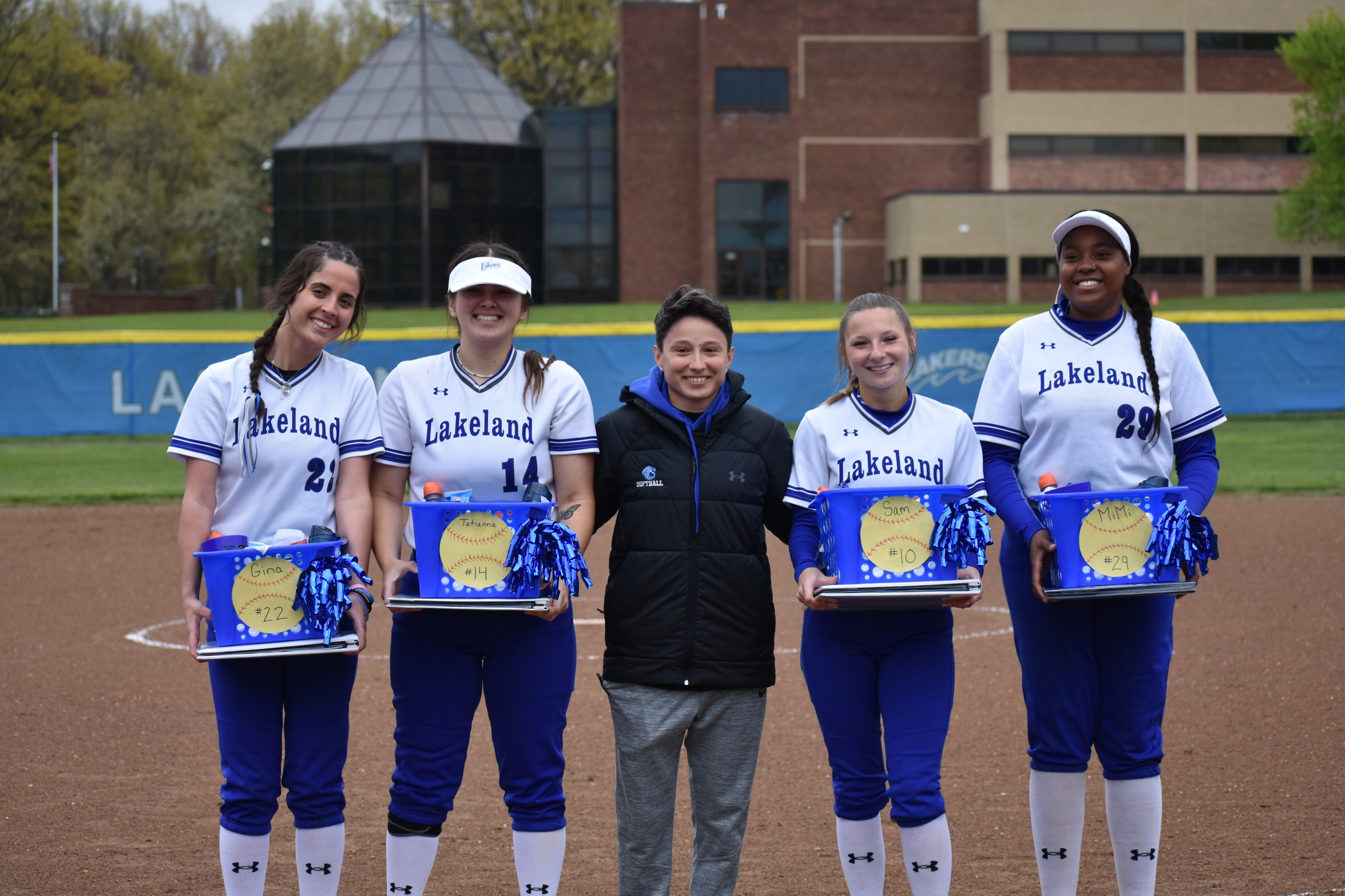 Lakeland sophomore players Gina Grandini, Tatianna Matuz, Coach Jordan Kramer, Samantha Toke, and Micaha Marbury (left to right)